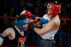 A powerful counterpunch by Bulat Bazarbayev of Lord’s Boxing Gym against Sean Slater of Sigma Alpha Mu. ©Charlie Pearce 