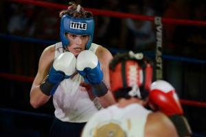 Parker Monteith of Sigma Chi & Richard Lord’s Boxing Gym squaring off against Bernardo de Alba of Texas Cowboys. ©Charlie Pearce
